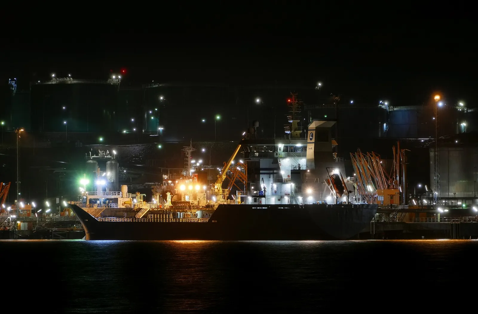 Oil tankers at a refinery terminal