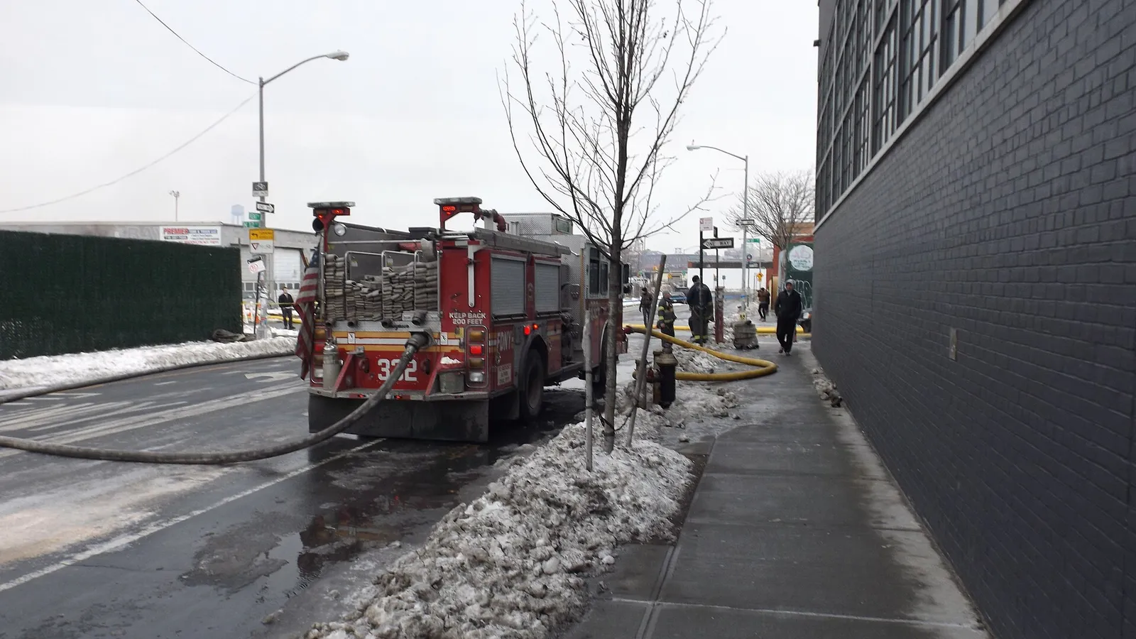 Firefighters battle a large warehouse blaze